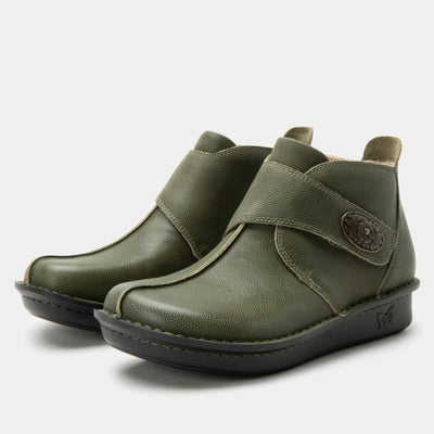 Alegria Caiti women’s ankle boots in avocado green leather with decorative buckle, hand stitching, padded collar, and slip-resistant mini outsole.