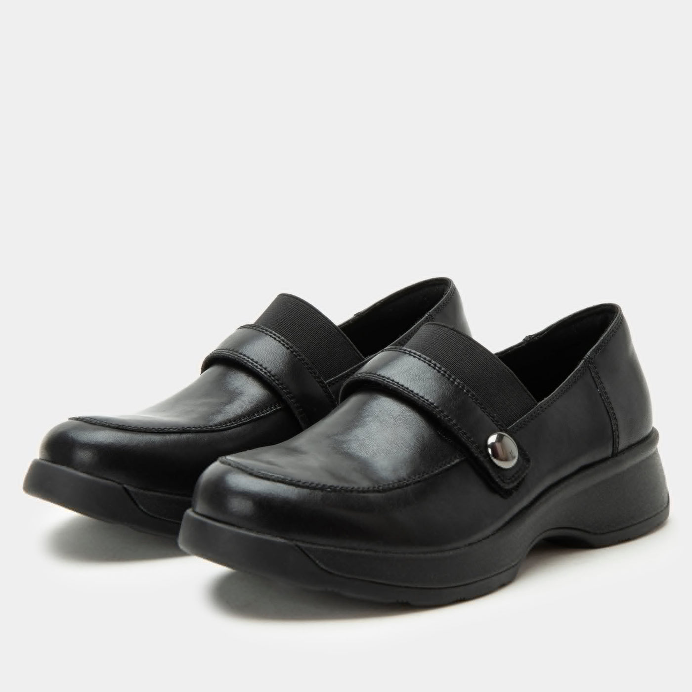 Alegria Janna women’s black leather penny loafers with adjustable strap, cushioned odor-control footbed, and slip-resistant outsole for stylish everyday comfort.