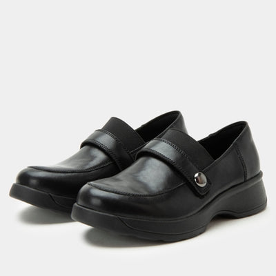 Alegria Janna women’s black leather penny loafers with adjustable strap, cushioned odor-control footbed, and slip-resistant outsole for stylish everyday comfort.