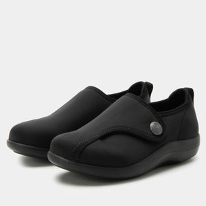 Black Alegria Marilynn stretch neoprene comfort shoes with adjustable strap, wide fit, cushioned lining, and slip-resistant outsole for flexible all-day wear.