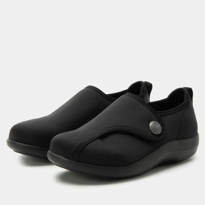 Black Alegria Marilynn stretch neoprene comfort shoes with adjustable strap, wide fit, cushioned lining, and slip-resistant outsole for flexible all-day wear.