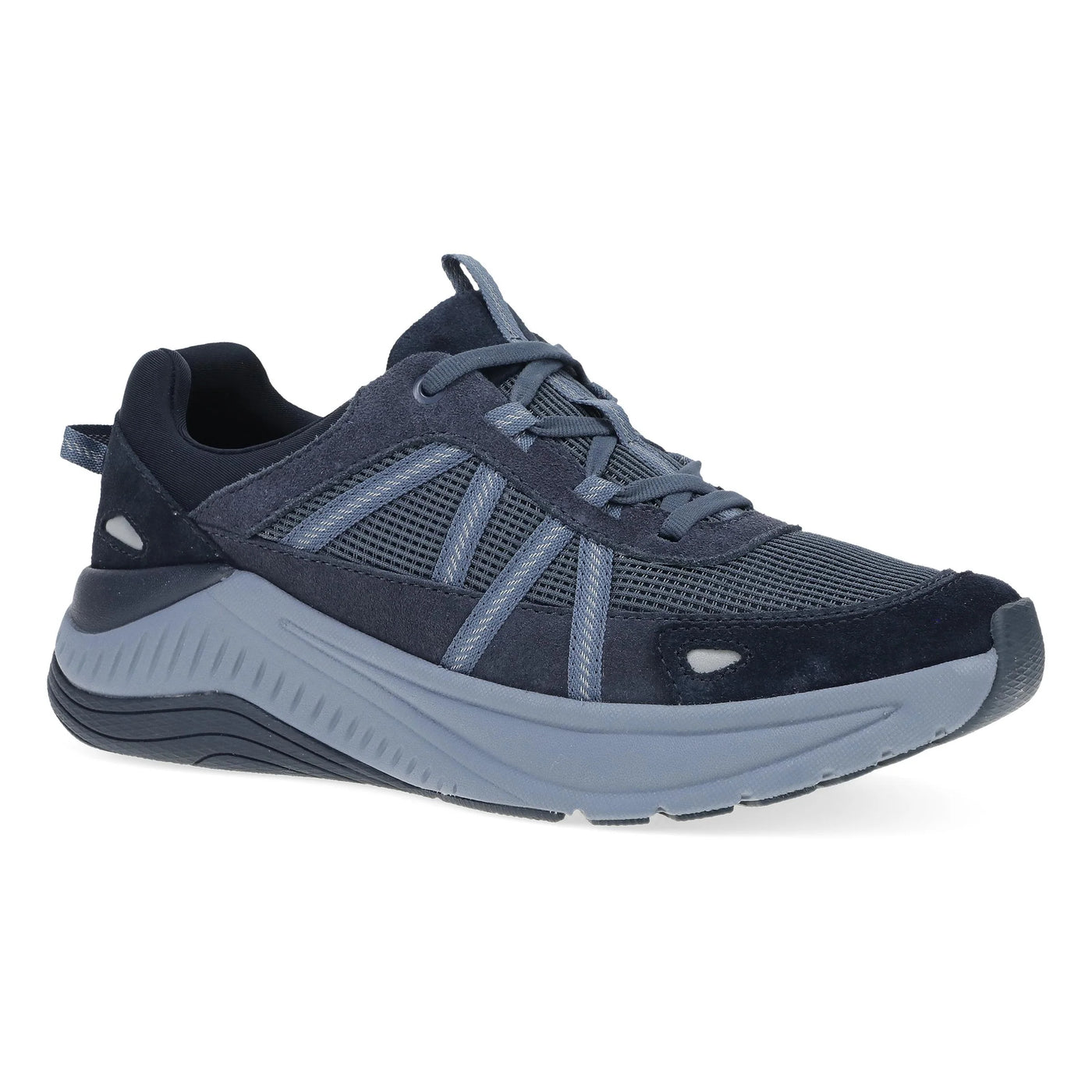 Dansko Women’s Poppy sneaker in Navy with leather and mesh uppers, supportive EVA sole, and moisture-wicking lining for all-day walking comfort.
