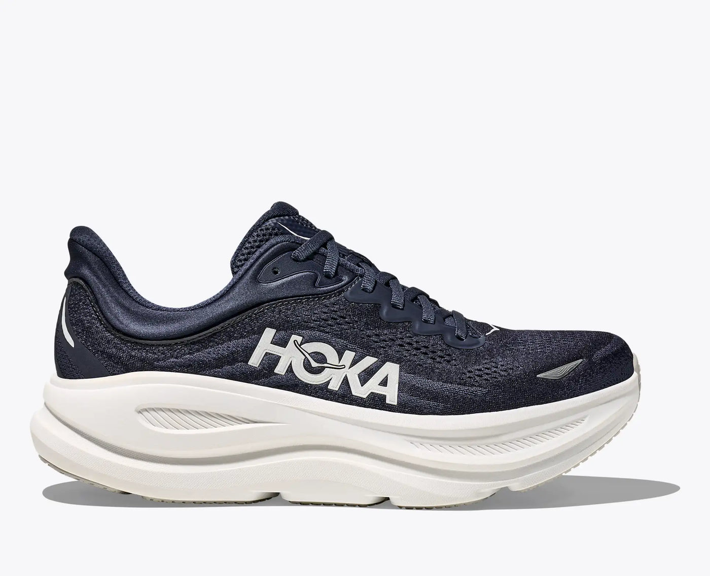 Men’s HOKA Bondi 9 in Varsity Navy featuring super-cushioned EVA midsole, breathable knit upper, and Durabrasion rubber outsole for daily comfort and durability.