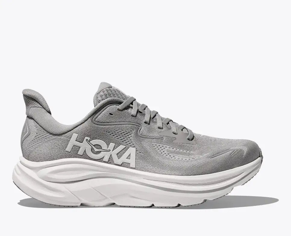 HOKA Clifton 10 men's running shoe in gray with white sole, featuring jacquard knit upper, ultralight CMEVA cushioning, and MetaRocker for smooth, stable daily runs and walks.