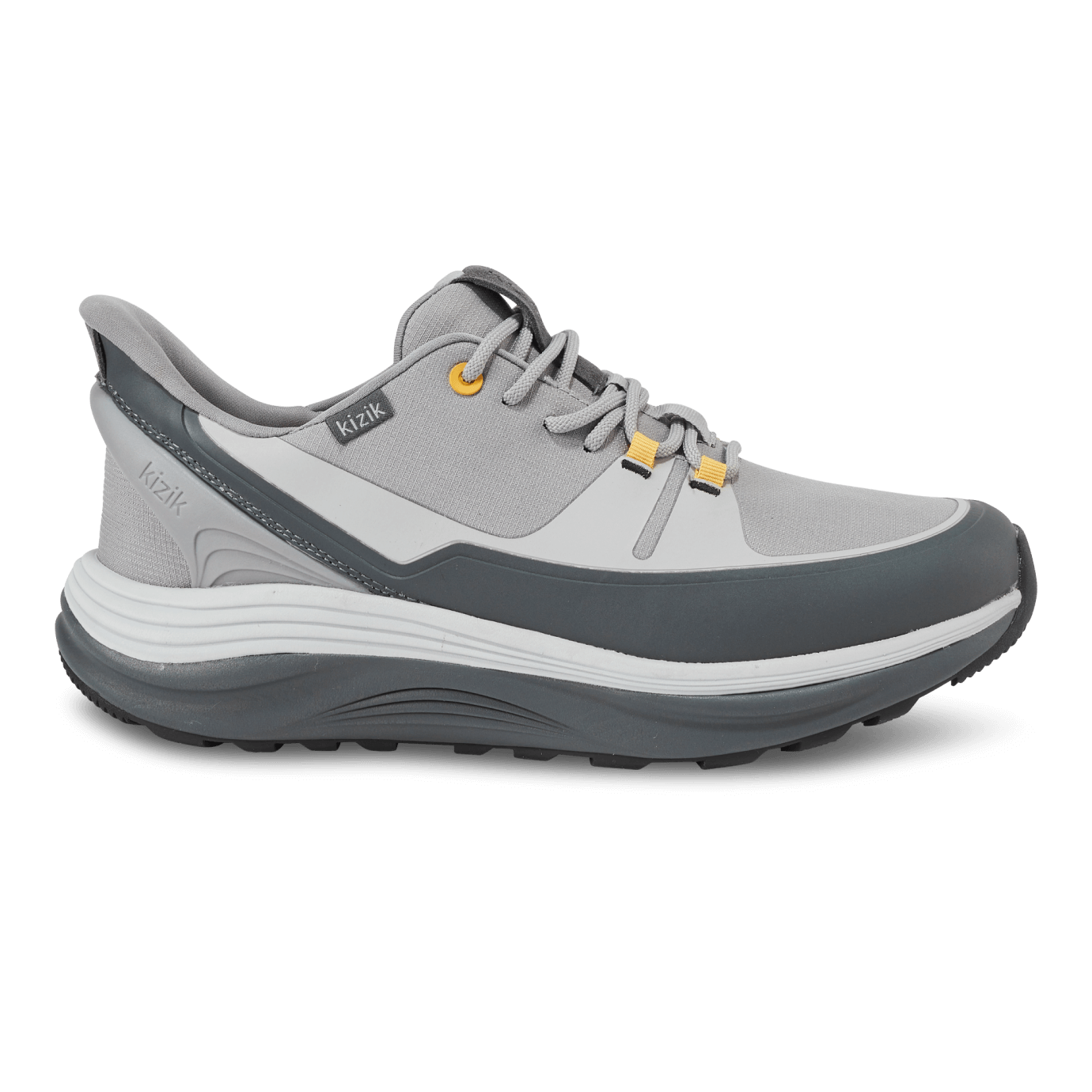 Kizik London AT men’s sneaker in alloy gray with poppy orange accents, rugged sole, lace-up front, and spring-back heel for hands-free wear and all-terrain travel comfort.
