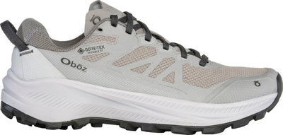 Oboz women's Katabatic LT Low GTX hiking shoe in light grey with breathable mesh upper, black laces, and GORE-TEX Invisible Fit for lightweight waterproof protection and all-day trail comfort.