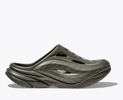 HOKA Ora Recovery Mule in slate color, featuring a sculpted EVA design with vented airflow channels, a sugarcane EVA midsole, and a futuristic slip-on silhouette for enhanced breathability and comfort.