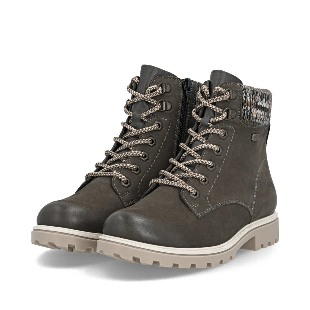 Remonte Women’s Smoke suede lace-up boots with knit collar, side zipper, removable insole, and water-resistant design for warmth and traction.