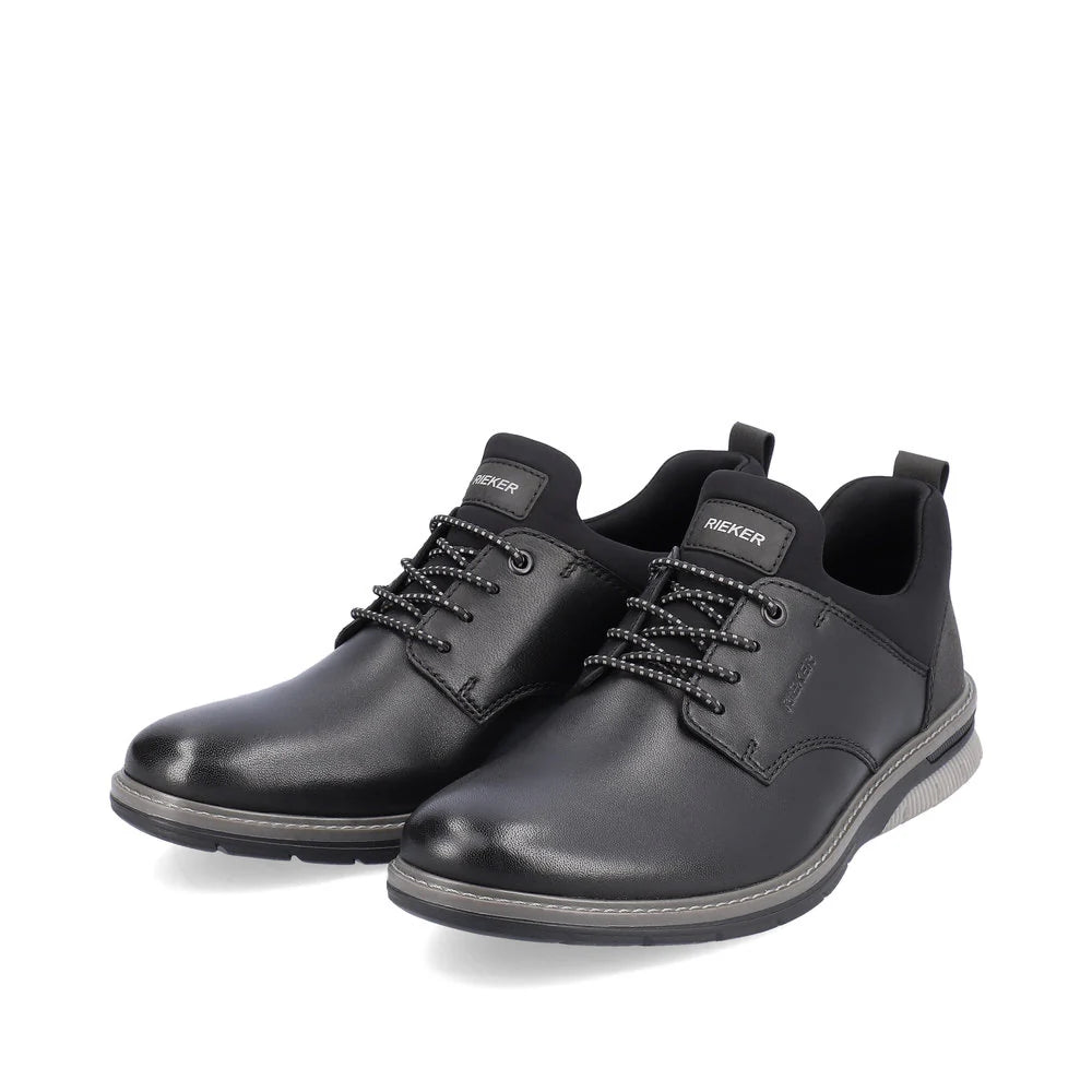 Rieker Men’s black leather casual shoes with elastic inserts, contrast stitching, and cushioned sole for flexible, breathable comfort.