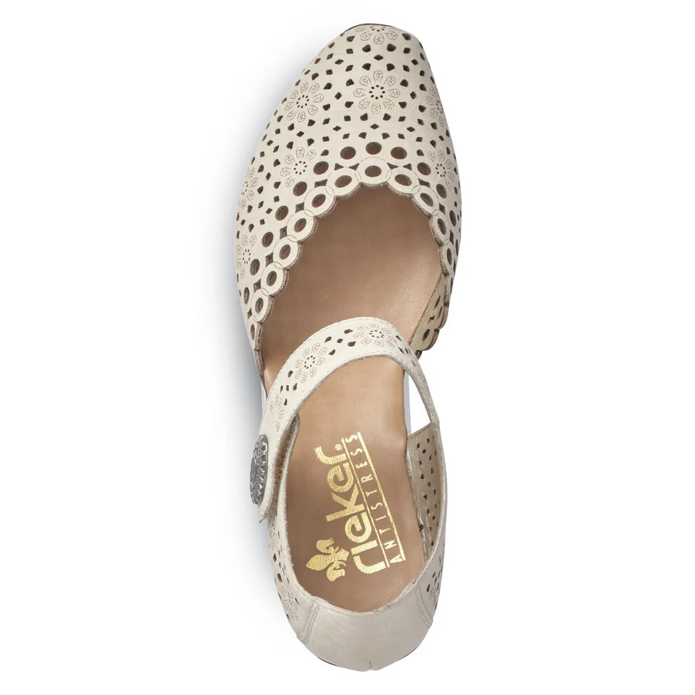 Beige low-heeled leather shoes with an elegant laser-cut floral design, an adjustable ankle strap with a metallic embellishment, and a sturdy 1.6-inch heel for versatile casual or dressy wear.