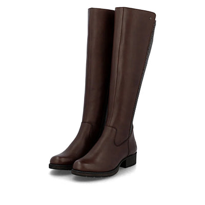 Rieker Women’s Ebony tall leather riding boots with side zipper, woven calf detail, and low block heel for elegant, all-day comfort.