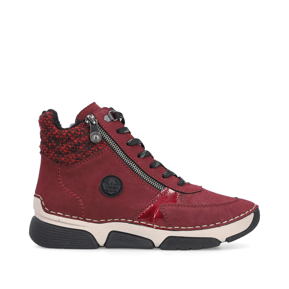 Women’s Rieker Bordeaux ankle boots with soft leather upper, fleece lining, lace and zip closure, and cushioned sole for all-day wear.
