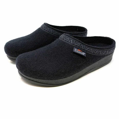 Men’s black wool clogs by Stegmann: one-piece Merino felt upper, patterned collar, and polyurethane sole; comfy for home or street.