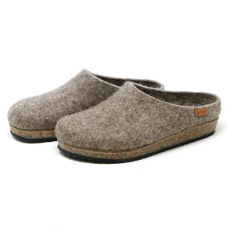 Natural grey undyed wool women’s clog by Stegmann; seamless upper, sustainable cork sole, textured rubber tread, roomy toe box.