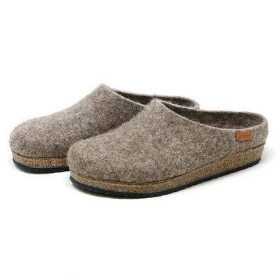 Natural grey undyed wool women’s clog by Stegmann; seamless upper, sustainable cork sole, textured rubber tread, roomy toe box.