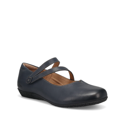Navy leather Taos Banter flats for women featuring cross V-strap closure, arch and metatarsal support, cushioned removable footbed, and flexible rubber sole.