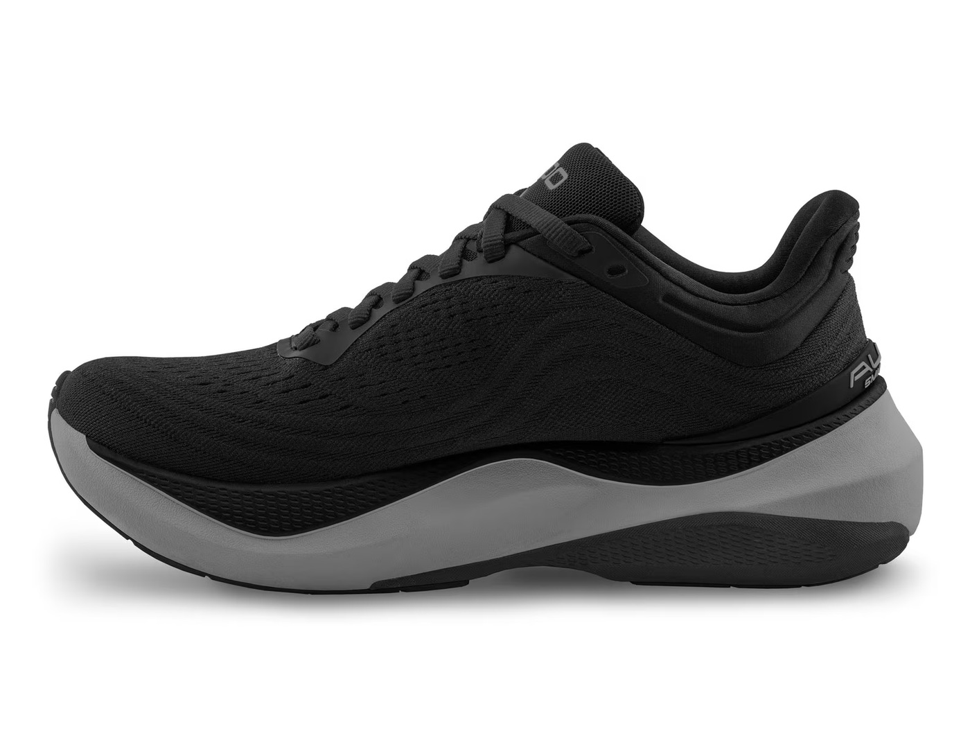 Side view of an all-black Topo running shoe with subtle tonal swirl logo on the side, topo branding on the gray sole, and a thick cushioned midsole for comfort and performance.