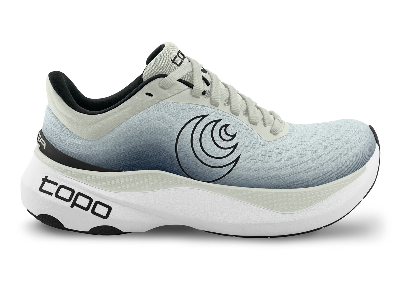 Side view of a light gray Topo running shoe with a gradient design fading into charcoal, featuring a black swirl logo on the side, 'topo' branding on the sole, and a thick white cushioned sole for comfort and performance.