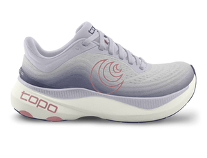 Side view of a lilac Topo running shoe with a gradient design fading into purple, featuring a pink swirl logo on the side, 'topo' branding on the cushioned sole, and pink accents for a stylish and comfortable design.