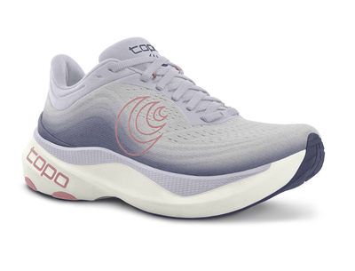 Side view of a lilac Topo running shoe with a gradient design fading into purple, featuring a pink swirl logo on the side, 'topo' branding on the cushioned sole, and pink accents for a stylish and comfortable design.