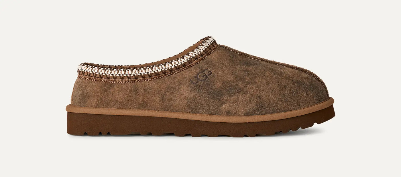 Side view of chestnut Tasman Baxter: textured suede with natural variations, braided collar trim, and cushioned EVA outsole.