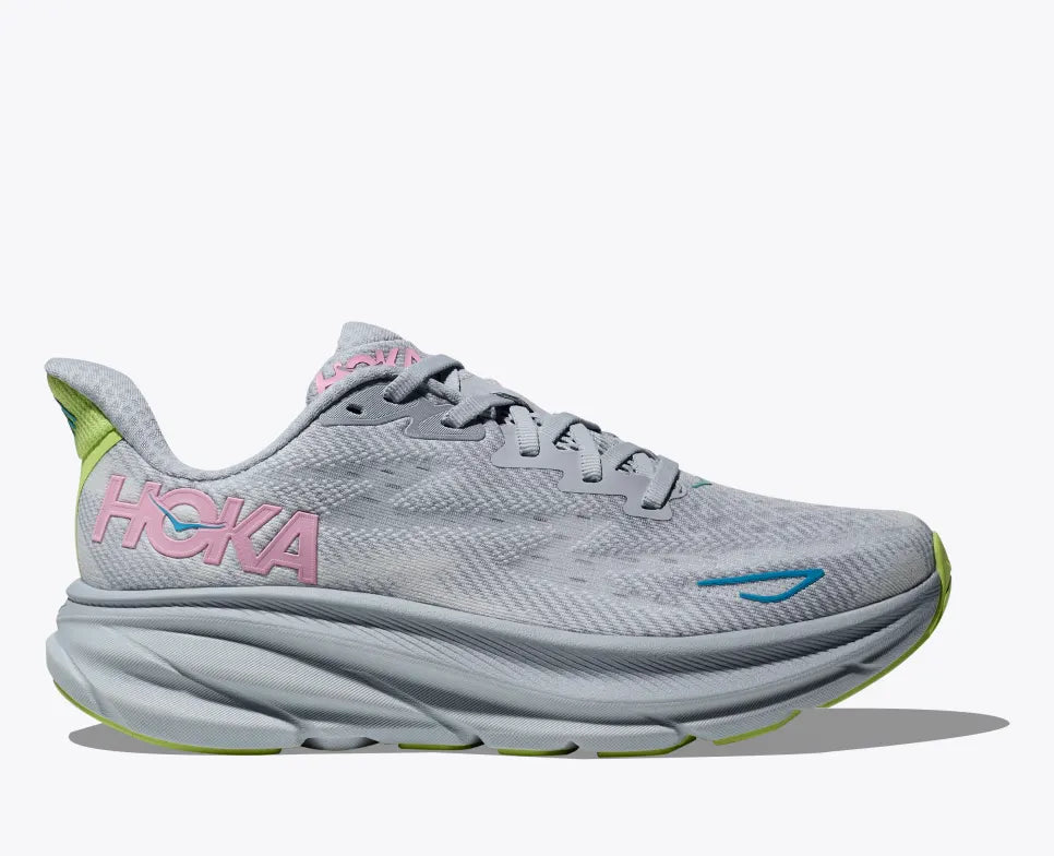 HOKA Clifton 9 running shoe in light gray with pink and blue accents, featuring a lightweight design, increased cushioning, and a responsive foam midsole for a smooth and comfortable ride.