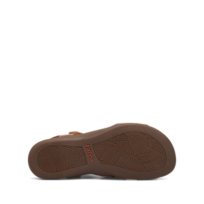 View of a natural beige Taos sandal featuring adjustable straps, a cushioned footbed with perforations, and a supportive sole.