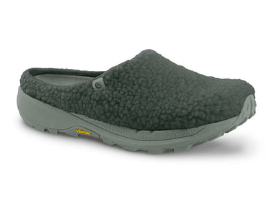 Women’s Topo Revive recovery slide in moss green—fleece slip-on with 3D Wave Sense massaging insole and Vibram XS Trek EVO outsole; side view.