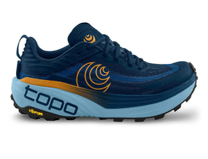 Blue Topo trail runner with orange detailing; thick ZipFoam midsole, rocker design, and Vibram Megagrip 4mm lugs for traction on technical trails.