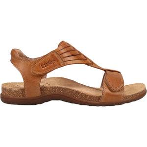 view of a brown leather Taos sandal featuring adjustable straps, a cork footbed, and a durable sole.