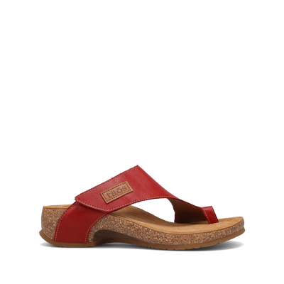 Side view of a pair of red Taos sandals featuring a slip-on design with a soft suede footbed and subtle stitching details.