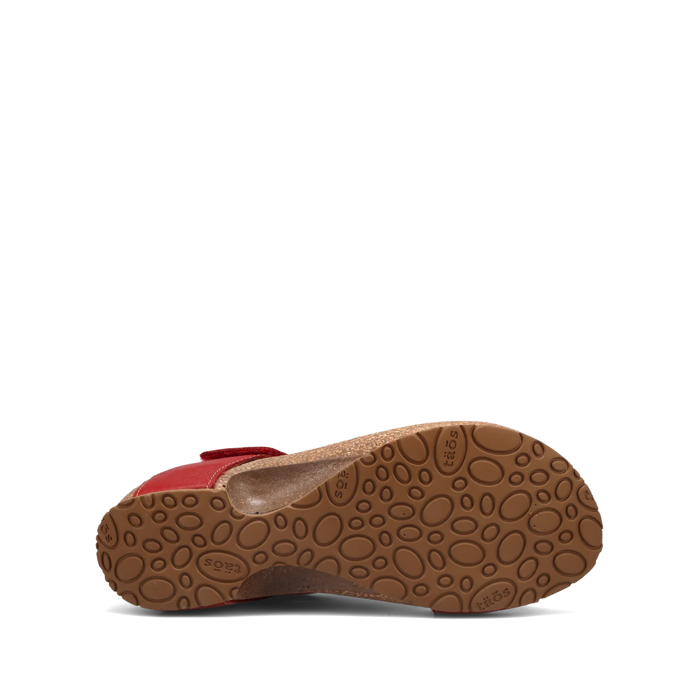 View of a pair of red Taos sandals featuring a slip-on design with a soft suede footbed and subtle stitching details.