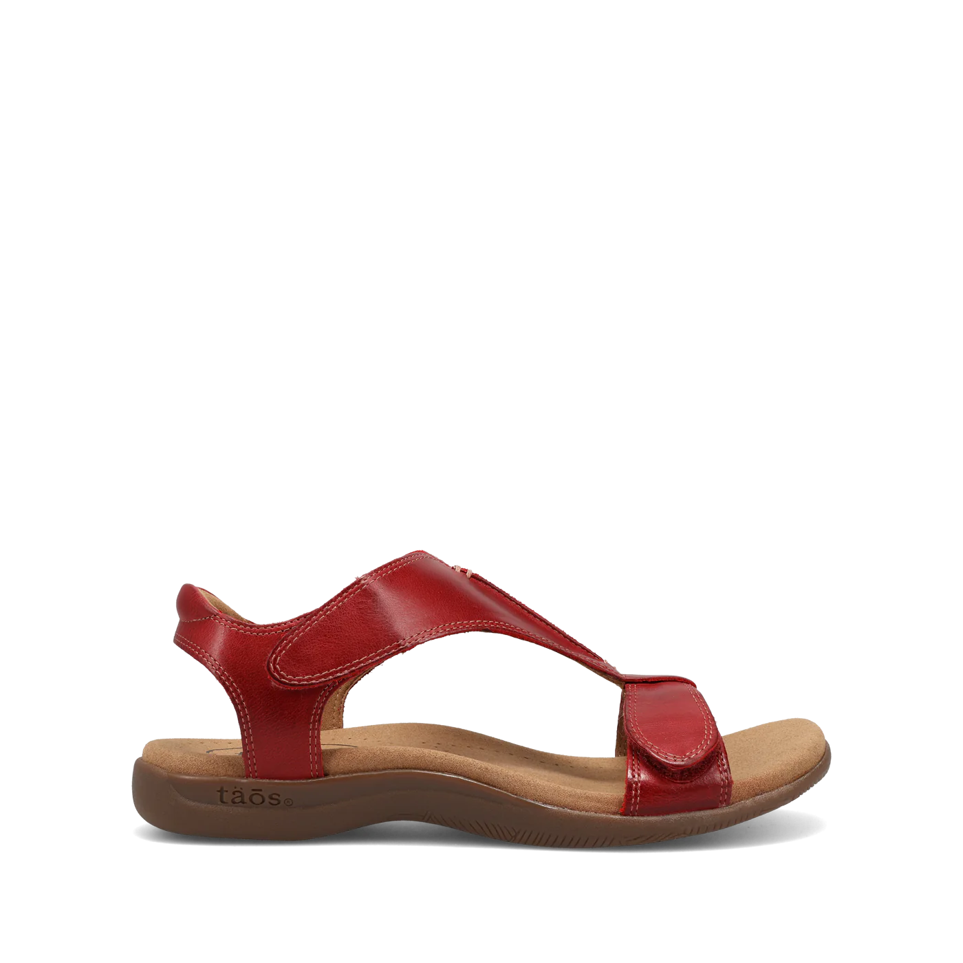 Side view of red Taos sandal featuring a T-strap design with adjustable straps and a cushioned footbed for comfort.