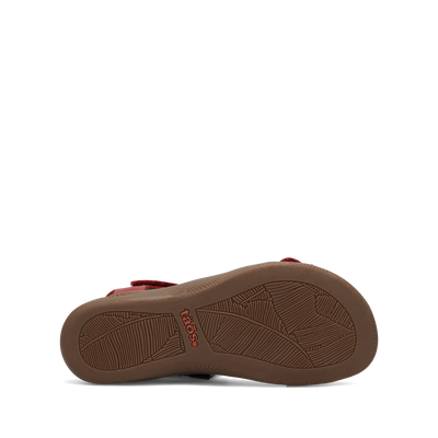 View of red Taos sandal featuring a T-strap design with adjustable straps and a cushioned footbed for comfort.