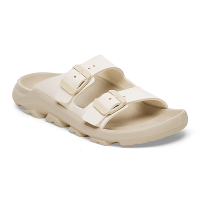 Birkenstock Mogami Terra sandals in beige with rugged tread, stealth buckles, and a water-resistant PU footbed designed for outdoor flexibility, grip, and durability.