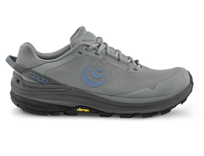 Topo Traverse low-top hiker/trail runner in grey—mesh upper, cushioned platform, Vibram Megagrip outsole, forefoot rock plate, and FKT quick-drain insole; side view.